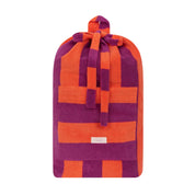 Purple and orange checkered bag on a white background