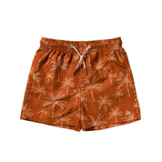 Brown shorts with palm tree pattern on a white background