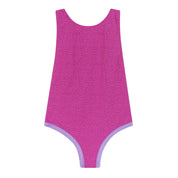 Pink swimsuit with a subtle pattern on a white background