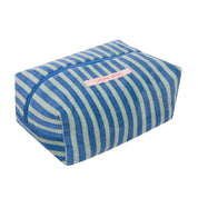 Blue and white striped rectangular pouch with a pink label on a white background