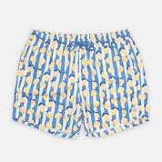 Blue and yellow patterned shorts on a light gray background